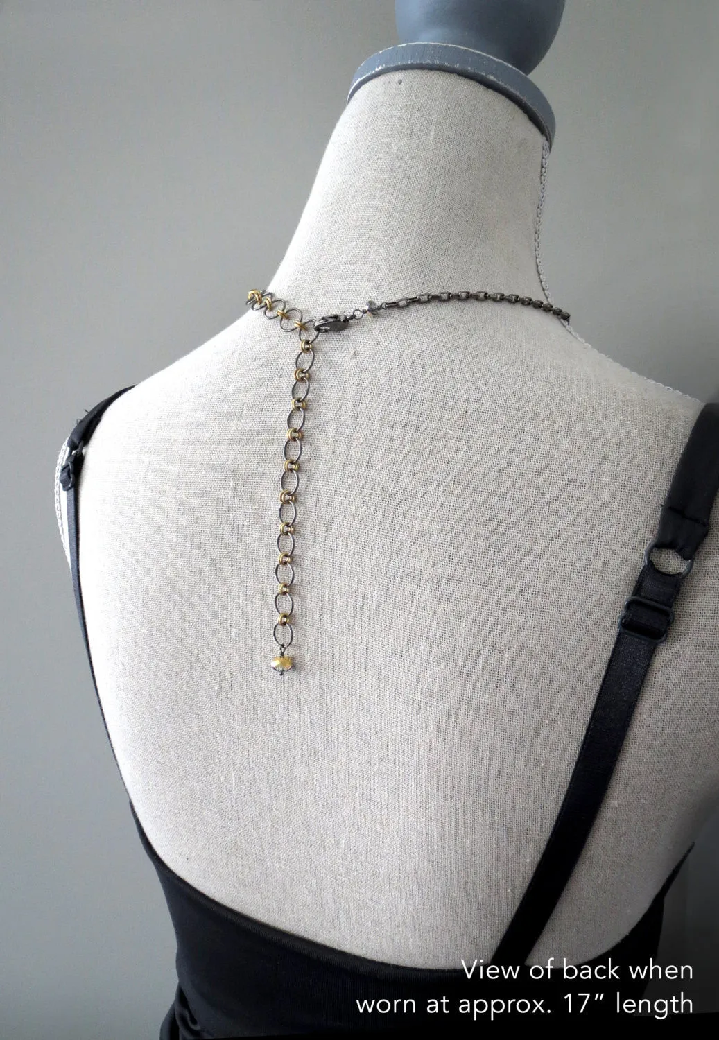 Black Night Crystal Teardrop Pendant Necklace with Gold Accents