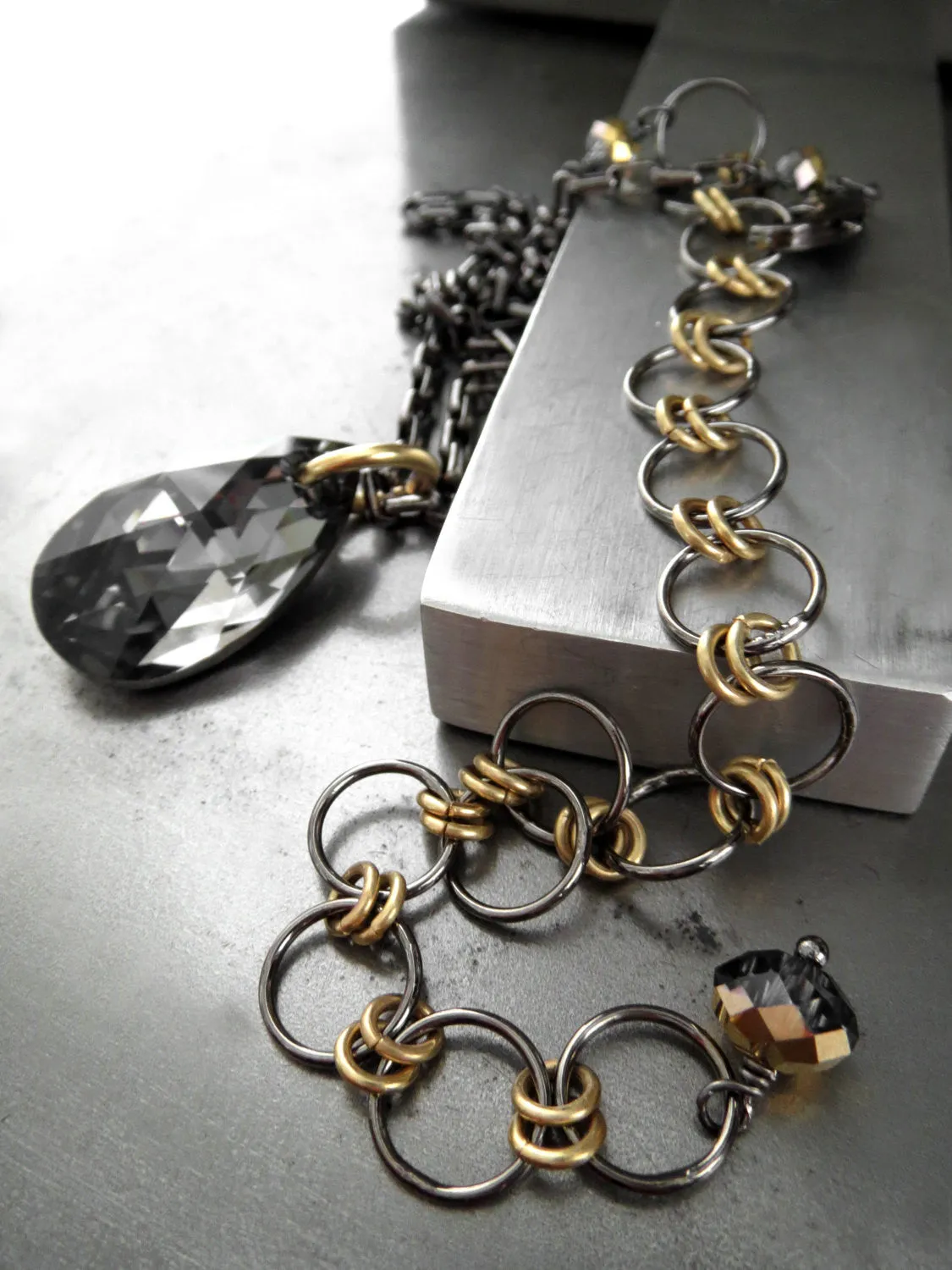 Black Night Crystal Teardrop Pendant Necklace with Gold Accents
