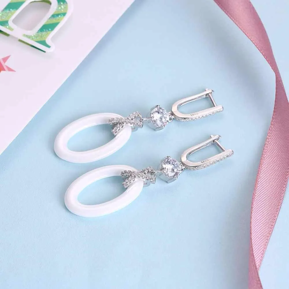 New Women Sterling Silver 925 Drop Earrings with White Ellipse Ceramic Zircon-Inserted Dangler Jewelry Gift