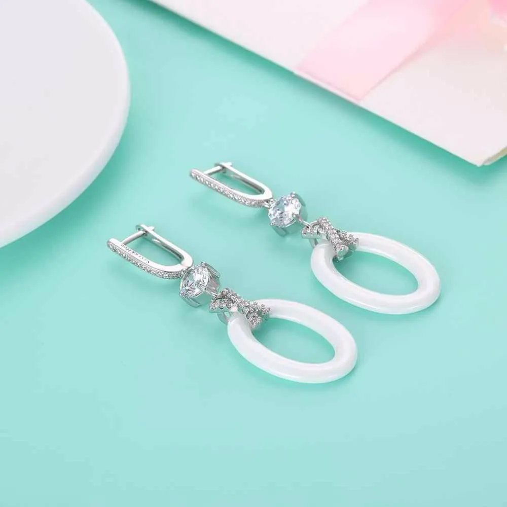 New Women Sterling Silver 925 Drop Earrings with White Ellipse Ceramic Zircon-Inserted Dangler Jewelry Gift