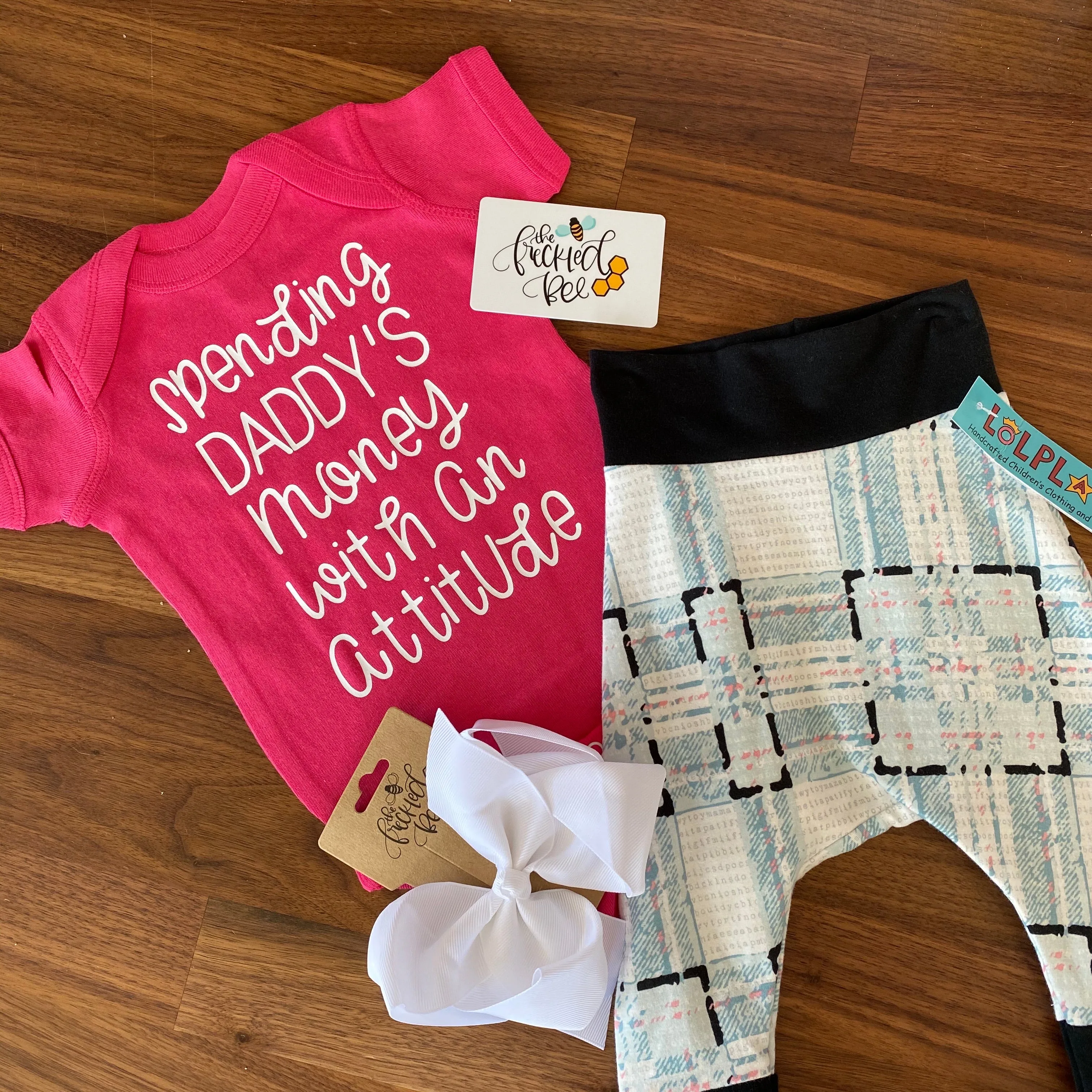 Spending Daddy’s Money with an Attitude Bodysuit or Tee